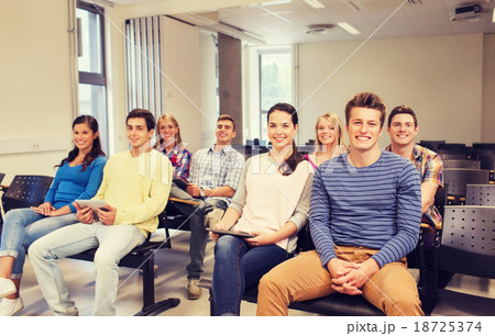 group of smiling students with tablet pc group of smiling students with tablet pc 18725374