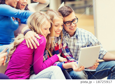 group of smiling students with tablet pc group of smiling students with tablet pc 18725917