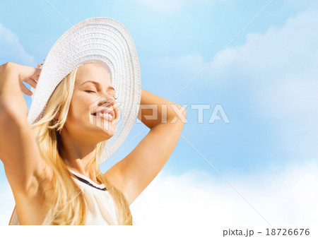 beautiful woman enjoying summer outdoors 18726676