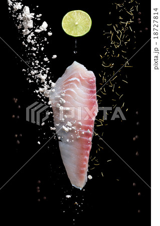 Pangasius fillet with spices and vegetables Pangasius fillet with spices and vegetables 18727814