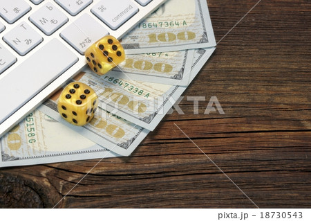 Keyboard, Gaming Dices And Cash On Wood Backgrou 18730543