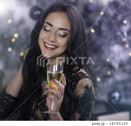 Young woman at christmas night Young woman at christmas night 18743124