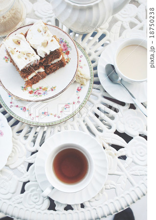 Carrot cake with hot tea Carrot cake with hot tea 18750238