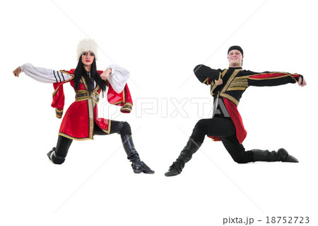 young couple wearing a folk costume dancing young couple wearing a folk costume dancing 18752723