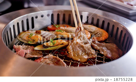 Mixed Roasted Meat and Seafood and Chopsticks 18755228
