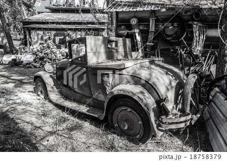 Old rusted car in junk yard Old rusted car in junk yard 18758379