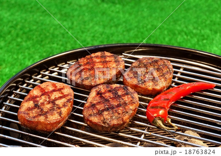 BBQ Hamburger And Chili Pepper On The Hot Grill BBQ Hamburger And Chili Pepper On The Hot Grill 18763824