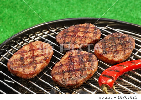 BBQ Hamburger And Chili Pepper On The Hot Grill BBQ Hamburger And Chili Pepper On The Hot Grill 18763825