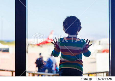 little tired kid boy at the airport, traveling little tired kid boy at the airport, traveling 18764426