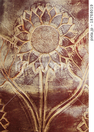 Ornated sunflower carving Ornated sunflower carving 18768019