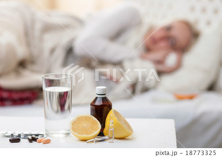 Sick young woman is suffering from influenza 18773325
