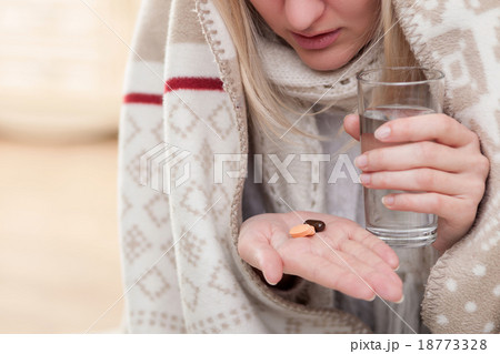 Pretty ill woman is suffering from flue Pretty ill woman is suffering from flue 18773328