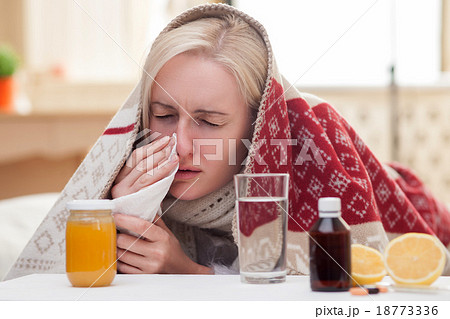 Ill young woman is suffering from flue Ill young woman is suffering from flue 18773336