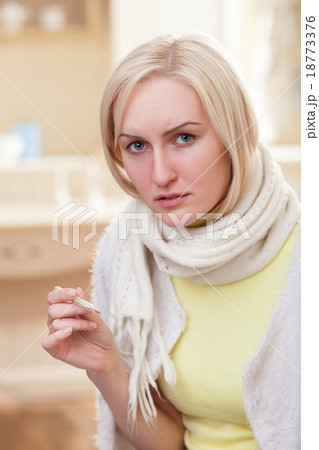 Cute young lady has caught a cold 18773376