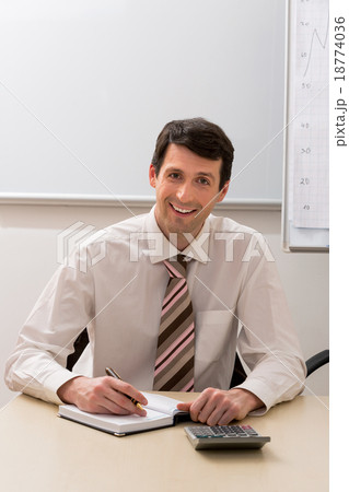 Financial director at work. Financial director at work. 18774036