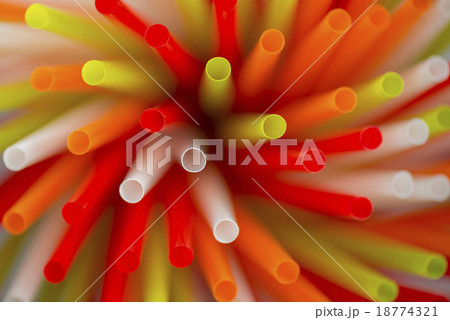 Collection colored drinking straws in blur. 18774321
