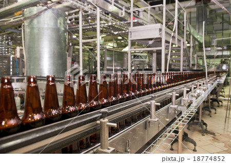 Beer bottles on the conveyor  18774852
