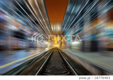 Railway station at night with motion blur effect 18776463