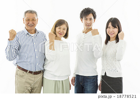 4人家族が横並びでガッツポーズの写真素材