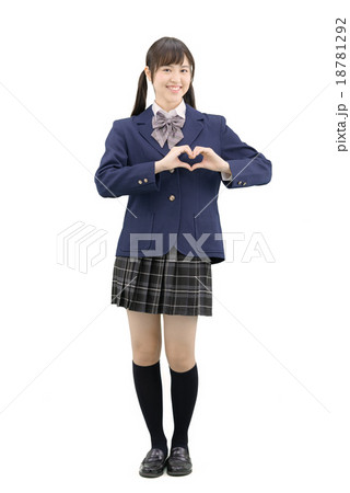 制服を着てポーズしている女子高生の全身白バックのイメージ 18781292