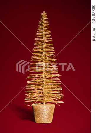 golden toy christmas tree on red 18782880