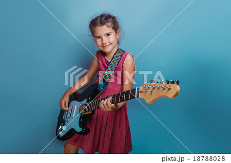 Girl European appearance ten years playing  guitar 18788028