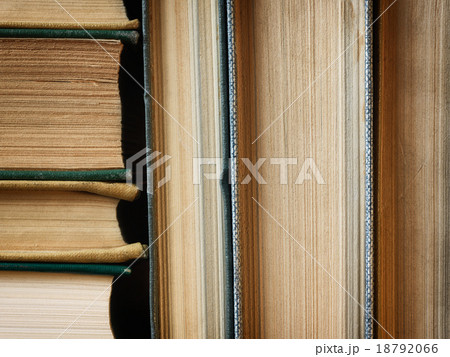 Background made of old books arranged in stacks Background made of old books arranged in stacks 18792066