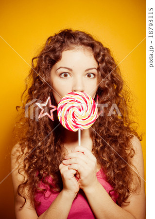 happy young woman with lollipop 18793115