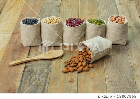 Different kinds of beans in sacks bag 18807968