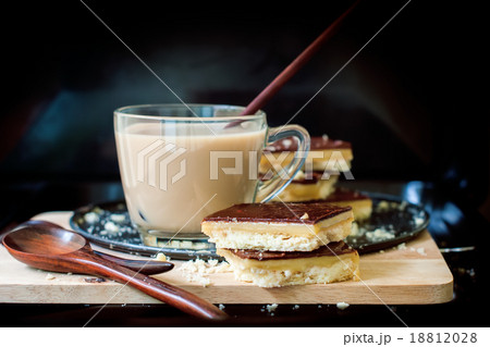 Tea with Chocolate Cookies on Black Background 18812028