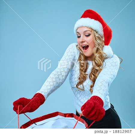 Beautiful young woman in Santa Claus clothes 18812907