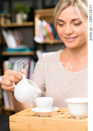 Tea drinking among books 18813831