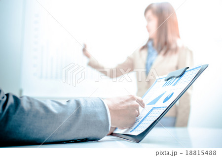 Business people discussing the charts and graphs showing the res 18815488