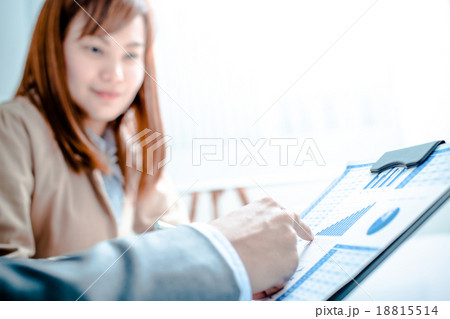 Business people discussing the charts and graphs showing the res 18815514