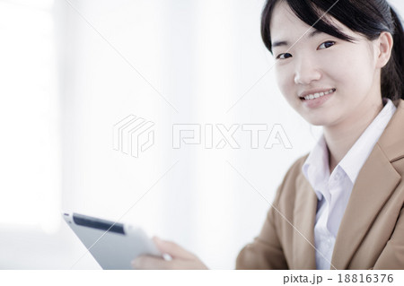 young asian businesswoman working in office 18816376