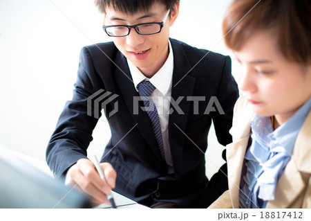 Business people discussing the charts and graphs showing the res 18817412