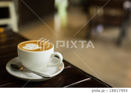 Hot art Latte Coffee in a cup on wooden table and Coffee shop bl 18817993