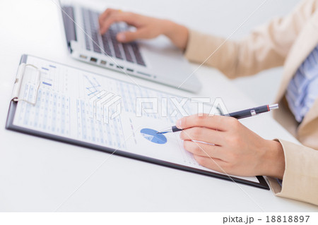 woman hand with business report 18818897