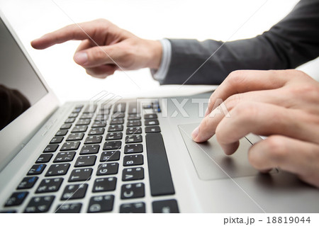 Close-up of male hands typing on laptop Close-up of male hands typing on laptop 18819044
