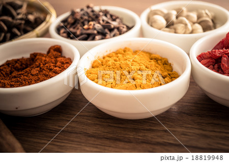 Wooden table of colorful spices Wooden table of colorful spices 18819948