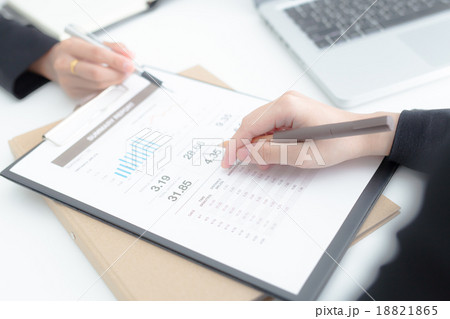 Business people discussing the charts and graphs showing the res 18821865