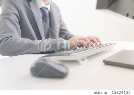 Businessman analyzing investment charts with computer. Accountin Businessman analyzing investment charts with computer. Accountin 18824150