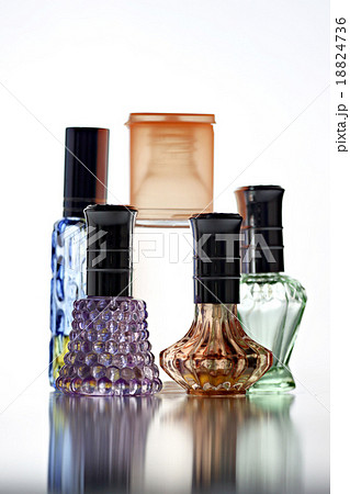 Many Bottle with Perfume different color isolated. 18824736