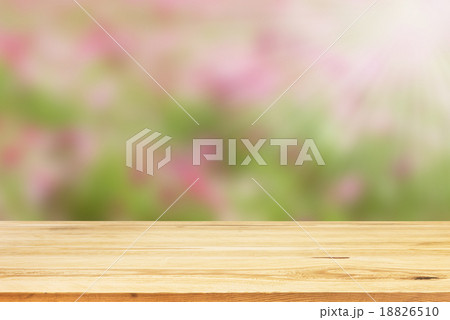 Wood table top on blurred background - can be used for montage o 18826510