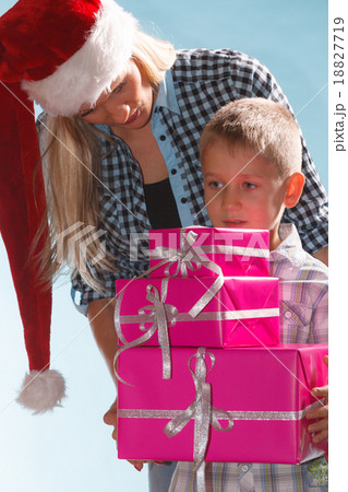 Mother and son with gift boxes 18827719