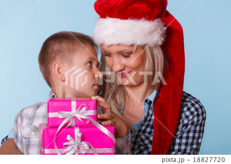 Mother and son with gift boxes 18827720
