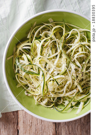 Low calorie zucchini pasta in bowl top view Low calorie zucchini pasta in bowl top view 18830395