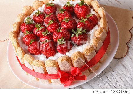 Delicate dessert strawberry cake closeup Delicate dessert strawberry cake closeup 18831360