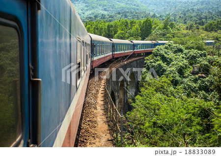Old train passing over the viaduct 18833089