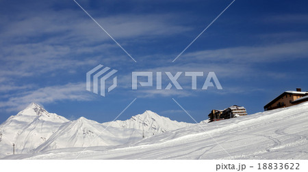 Panoramic view on ski slope and hotels in mountain 18833622